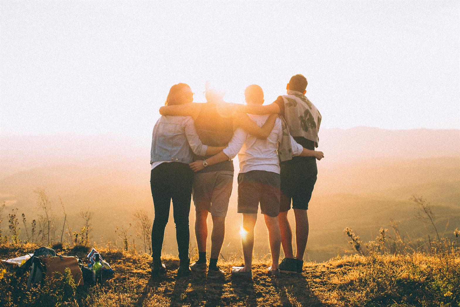 Friends looking into the sunset