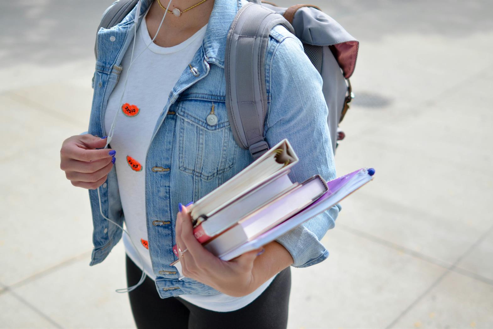 A college student carrying books