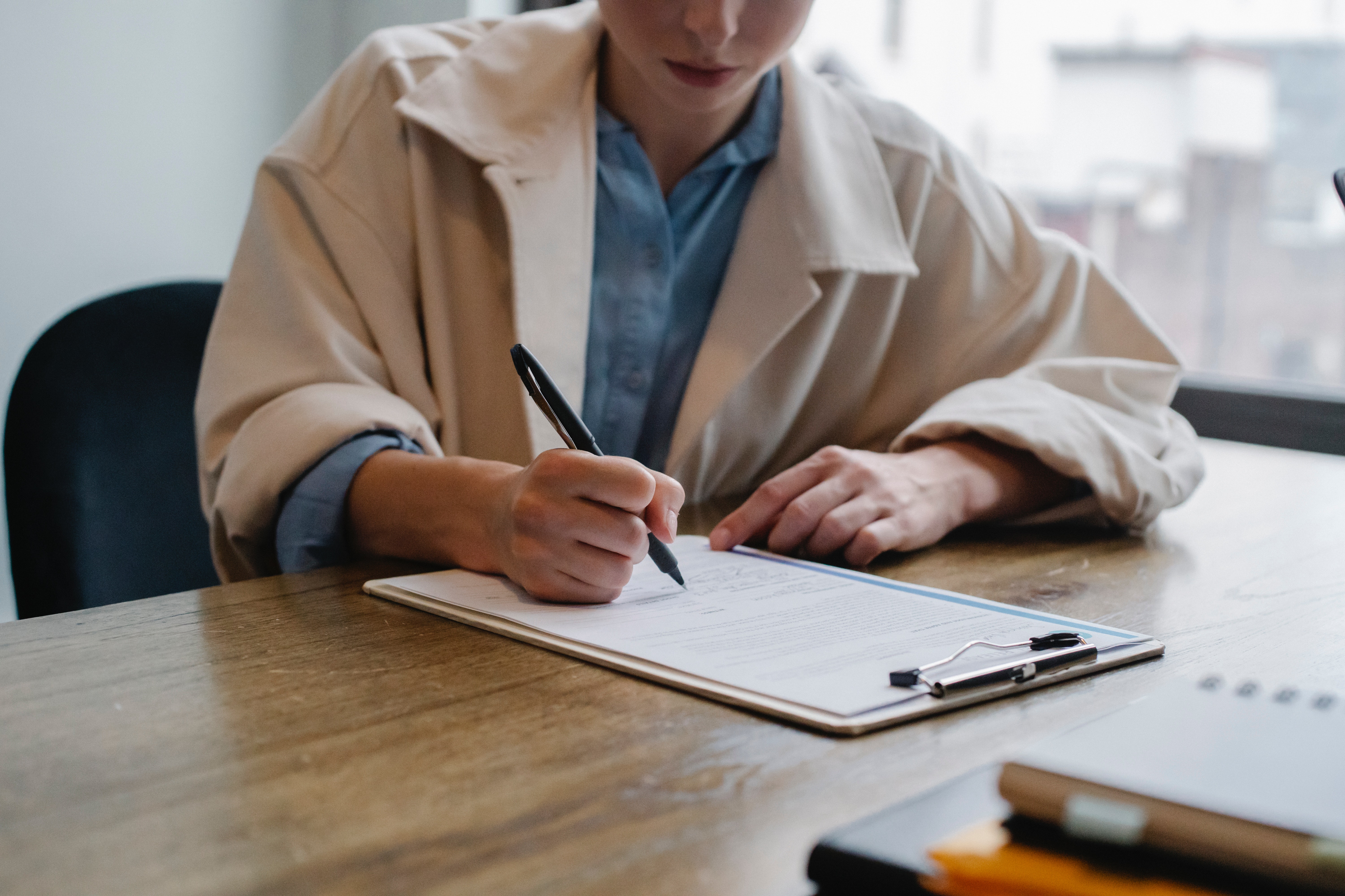 A person reviewing a form
