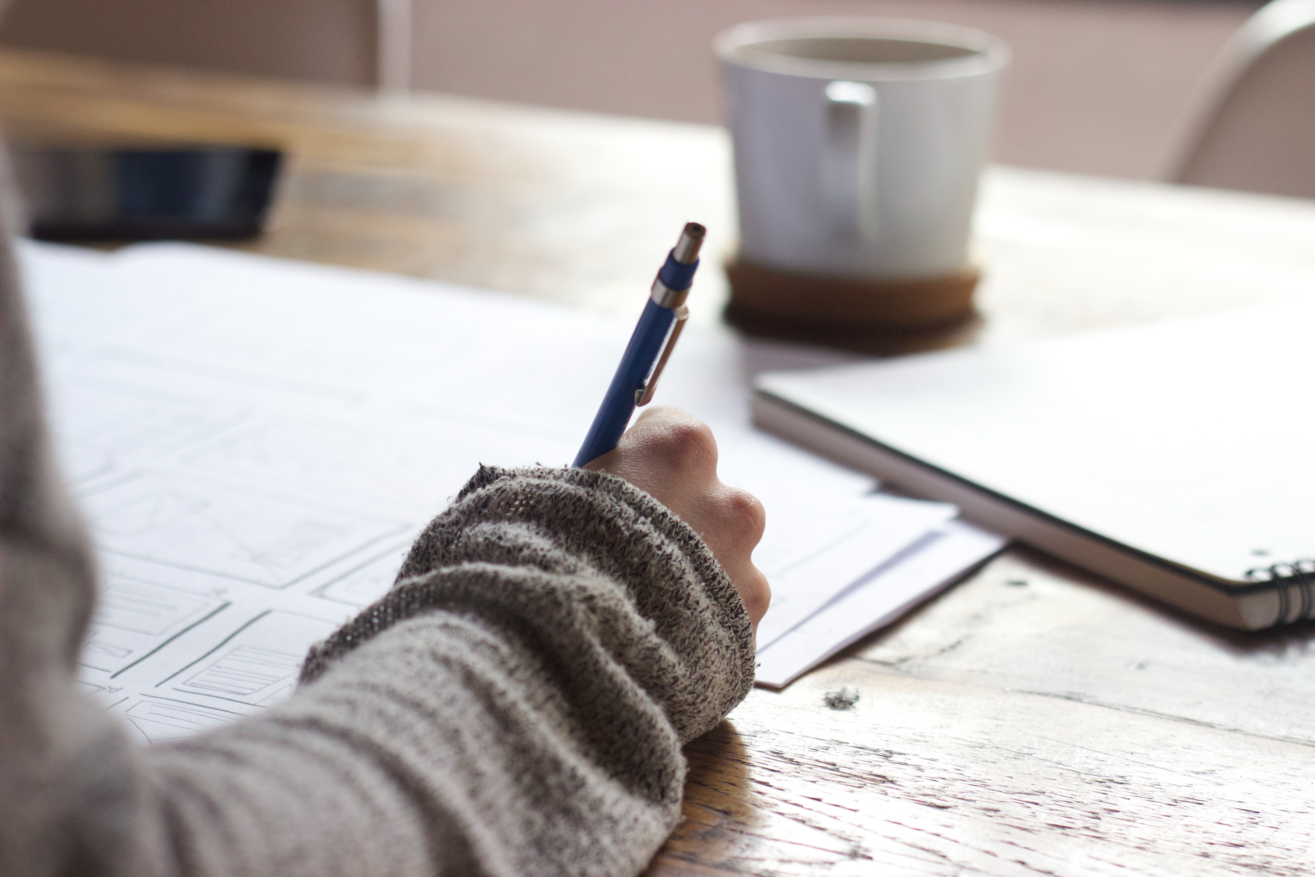 A person reviewing a form