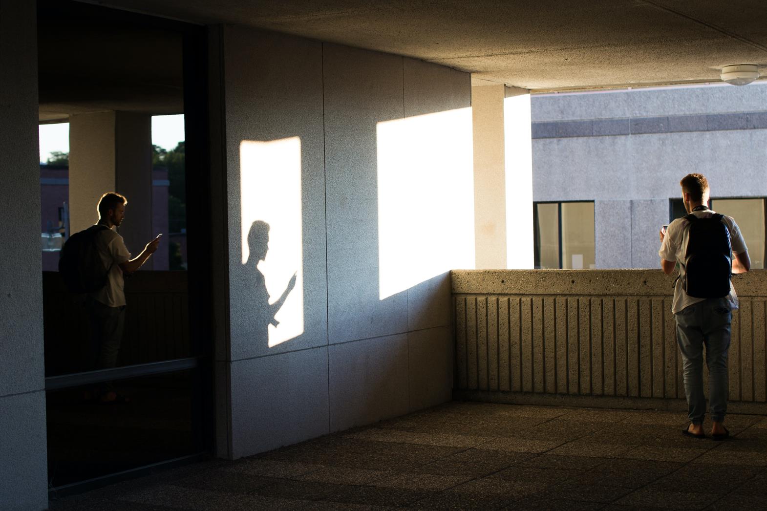 A man standing on a balcony