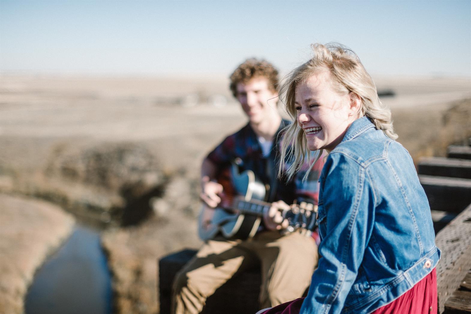 Two people hanging out outdoors