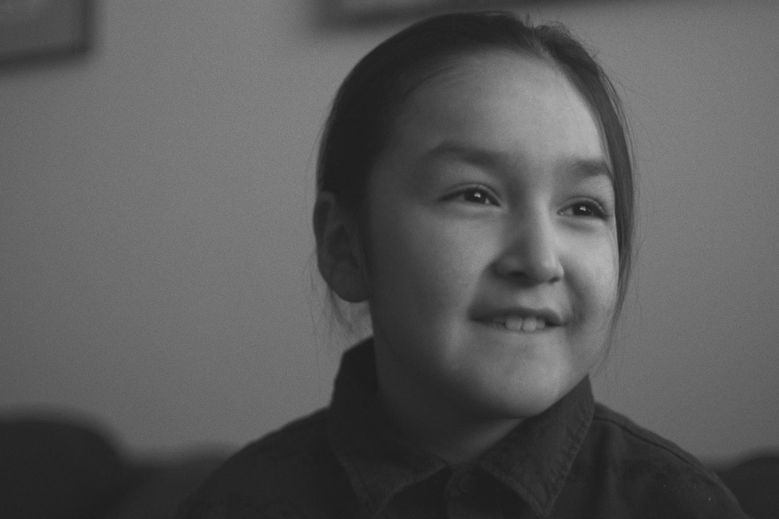Greyscale photo of a child