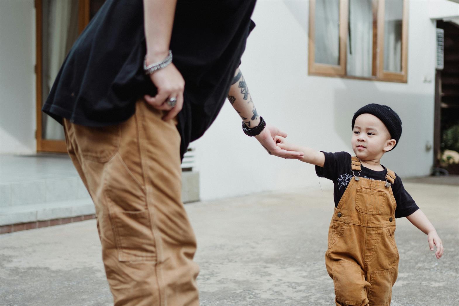 Baby Boy Holding His Fathers Hand